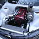 Yes, that is an RB26 from a Skyline GT-R in there. No, I don’t know how they did it.